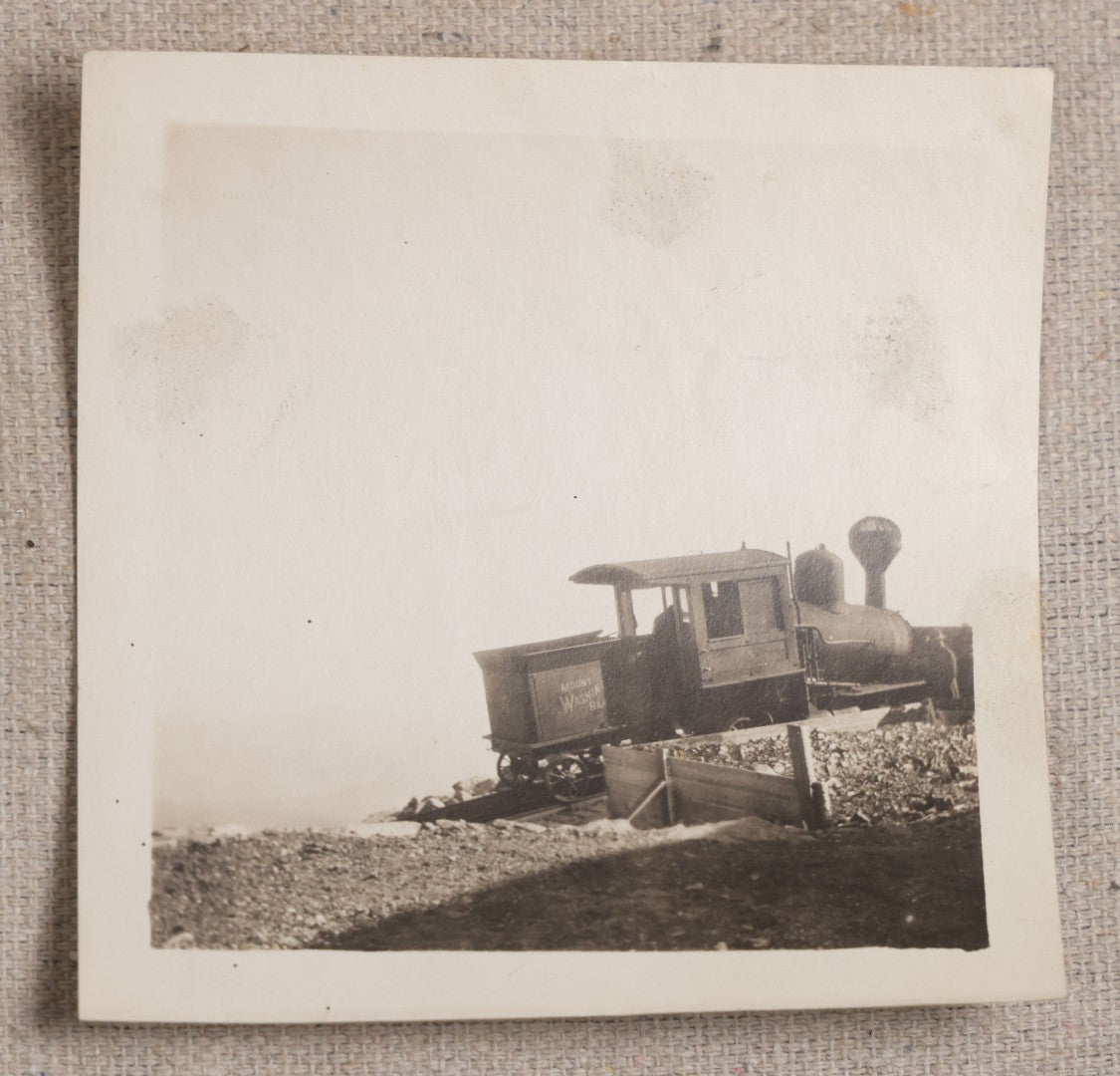 Lot 121 - Grouping Of 18 Antique And Vintage Snapshot Photographs, Including The Old Man Of The Mountain, Mount Washington Railway, Coca-Cola Billboard In A Flood, Girls Dancing In Flower Headbands, Liberty Bell, And Early Motion Picture Camera