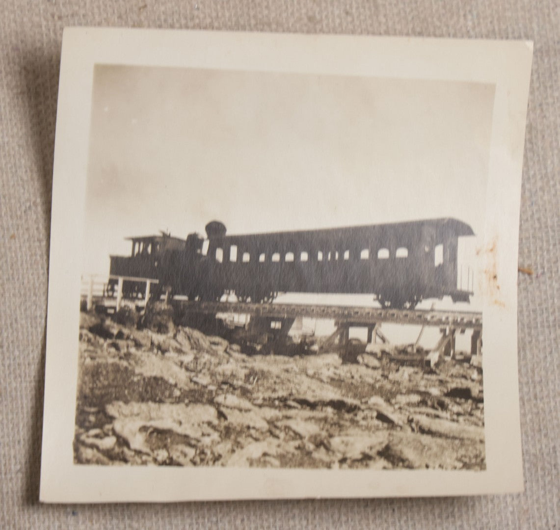 Lot 121 - Grouping Of 18 Antique And Vintage Snapshot Photographs, Including The Old Man Of The Mountain, Mount Washington Railway, Coca-Cola Billboard In A Flood, Girls Dancing In Flower Headbands, Liberty Bell, And Early Motion Picture Camera