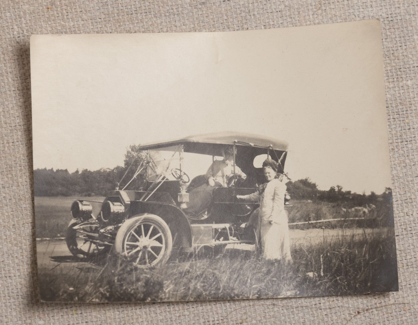 Lot 121 - Grouping Of 18 Antique And Vintage Snapshot Photographs, Including The Old Man Of The Mountain, Mount Washington Railway, Coca-Cola Billboard In A Flood, Girls Dancing In Flower Headbands, Liberty Bell, And Early Motion Picture Camera