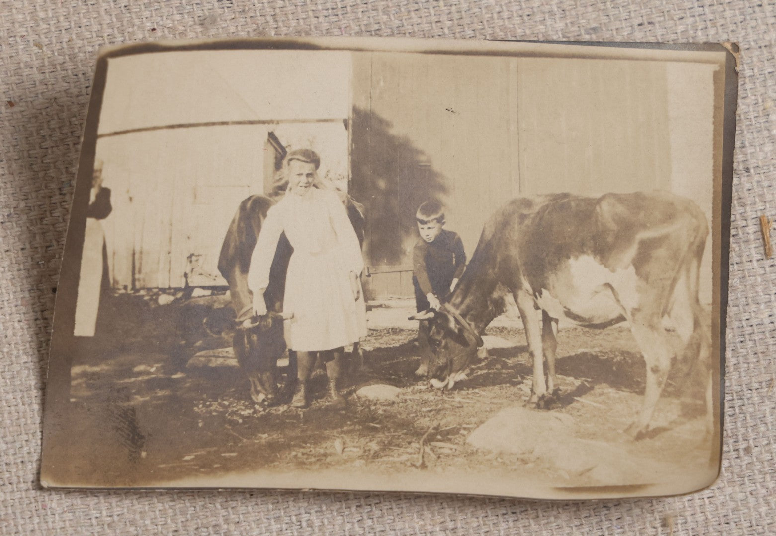 Lot 121 - Grouping Of 18 Antique And Vintage Snapshot Photographs, Including The Old Man Of The Mountain, Mount Washington Railway, Coca-Cola Billboard In A Flood, Girls Dancing In Flower Headbands, Liberty Bell, And Early Motion Picture Camera