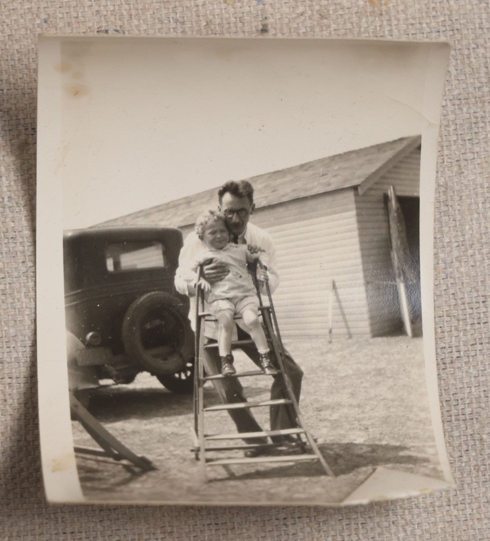 Lot 121 - Grouping Of 18 Antique And Vintage Snapshot Photographs, Including The Old Man Of The Mountain, Mount Washington Railway, Coca-Cola Billboard In A Flood, Girls Dancing In Flower Headbands, Liberty Bell, And Early Motion Picture Camera