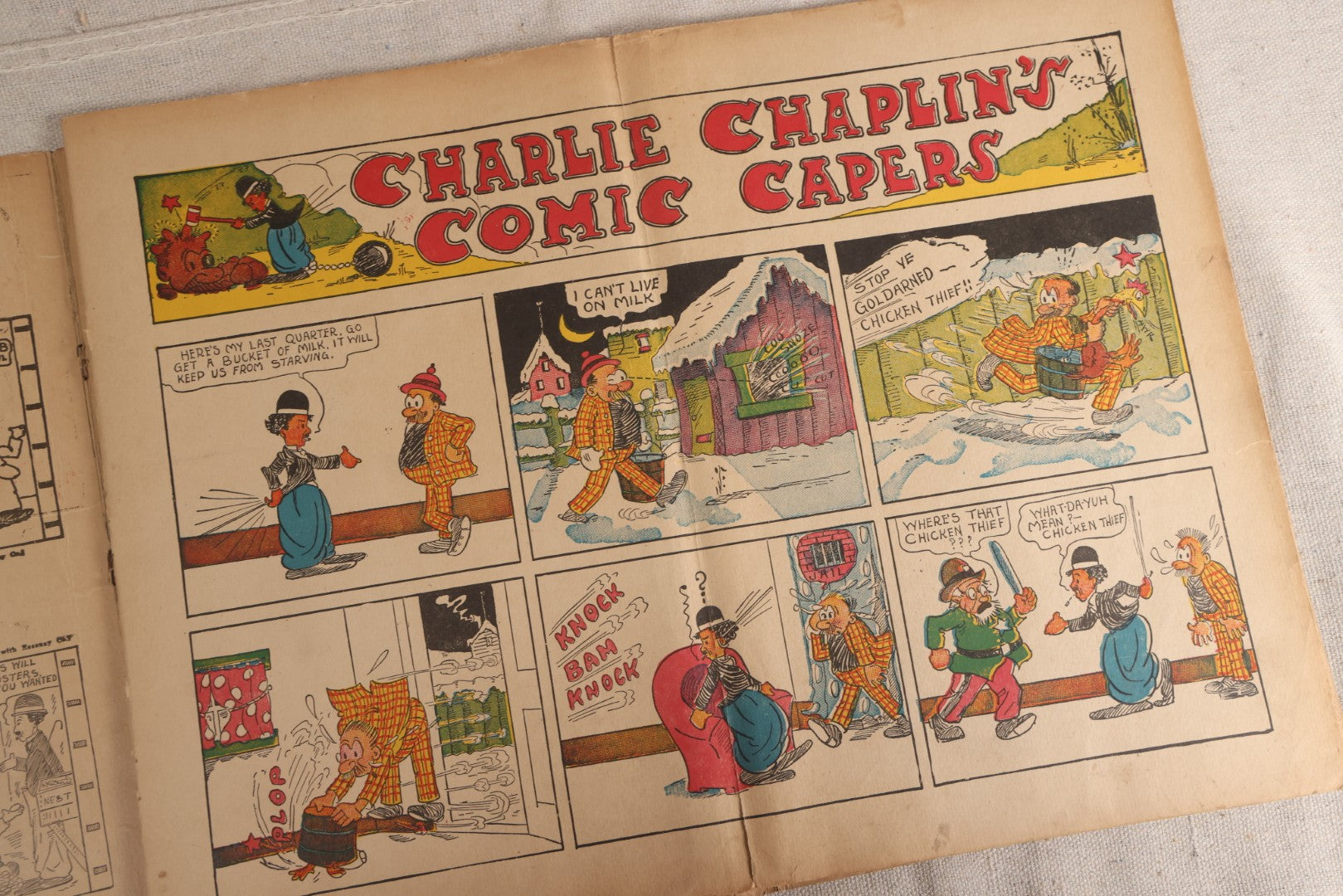 Lot 123 - "Charlie Chaplin's Funny Stunts" Antique Color Illustrated Comic Book, No. 380, Published By M. A. Donohue & Co., Chicago And New York, 1917, Note Large Fold Through Center