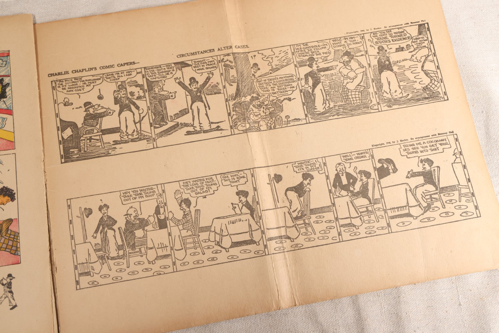 Lot 123 - "Charlie Chaplin's Funny Stunts" Antique Color Illustrated Comic Book, No. 380, Published By M. A. Donohue & Co., Chicago And New York, 1917, Note Large Fold Through Center