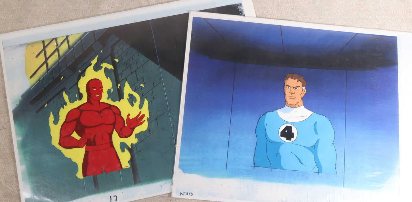 Lot 126 - Pair Of Vintage Marvel "Fantastic Four" Production Animation Cels, Human Torch And Mr. Fantastic With Painted Backgrounds, 1994-1996, A.I.A. Certificates Of Authenticity