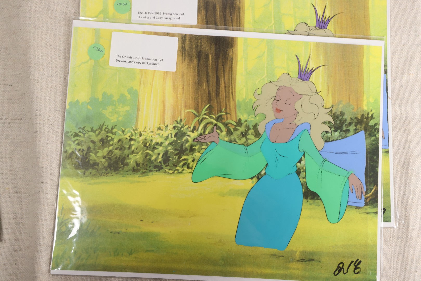 Lot 130 - Grouping Of 10+ Vintage "The Oz Kids" Production Animation Ephemera, Including Cels, Production Drawings, And Backgrounds, Hyperion Animation, 1996-1997
