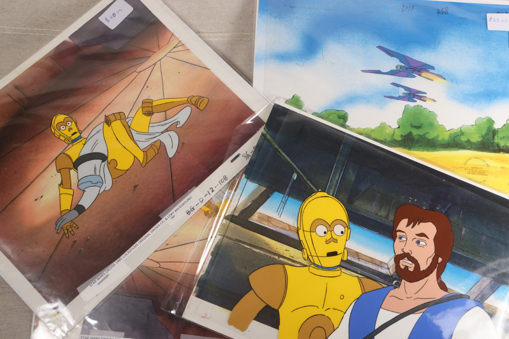 Lot 131 - Grouping Of 14+ Vintage "Star Wars: Droids" Production Animation Cels, Production Drawings, And Backgrounds, Nelvana/Lucasfilm, 1985-1986