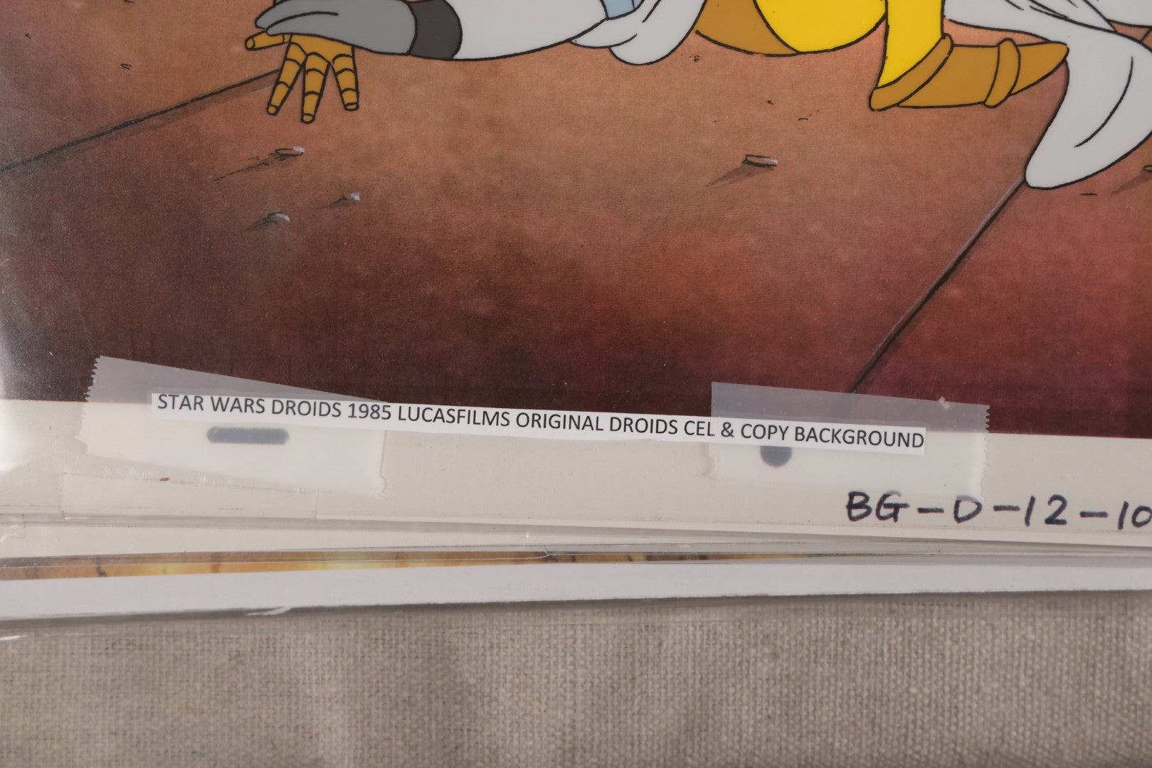 Lot 131 - Grouping Of 14+ Vintage "Star Wars: Droids" Production Animation Cels, Production Drawings, And Backgrounds, Nelvana/Lucasfilm, 1985-1986