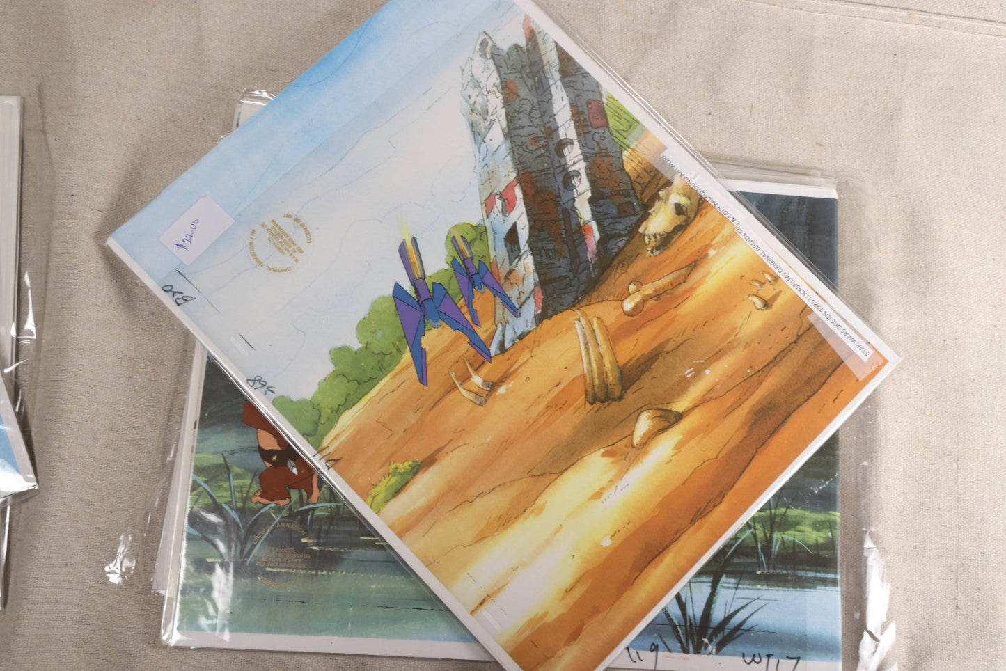 Lot 131 - Grouping Of 14+ Vintage "Star Wars: Droids" Production Animation Cels, Production Drawings, And Backgrounds, Nelvana/Lucasfilm, 1985-1986