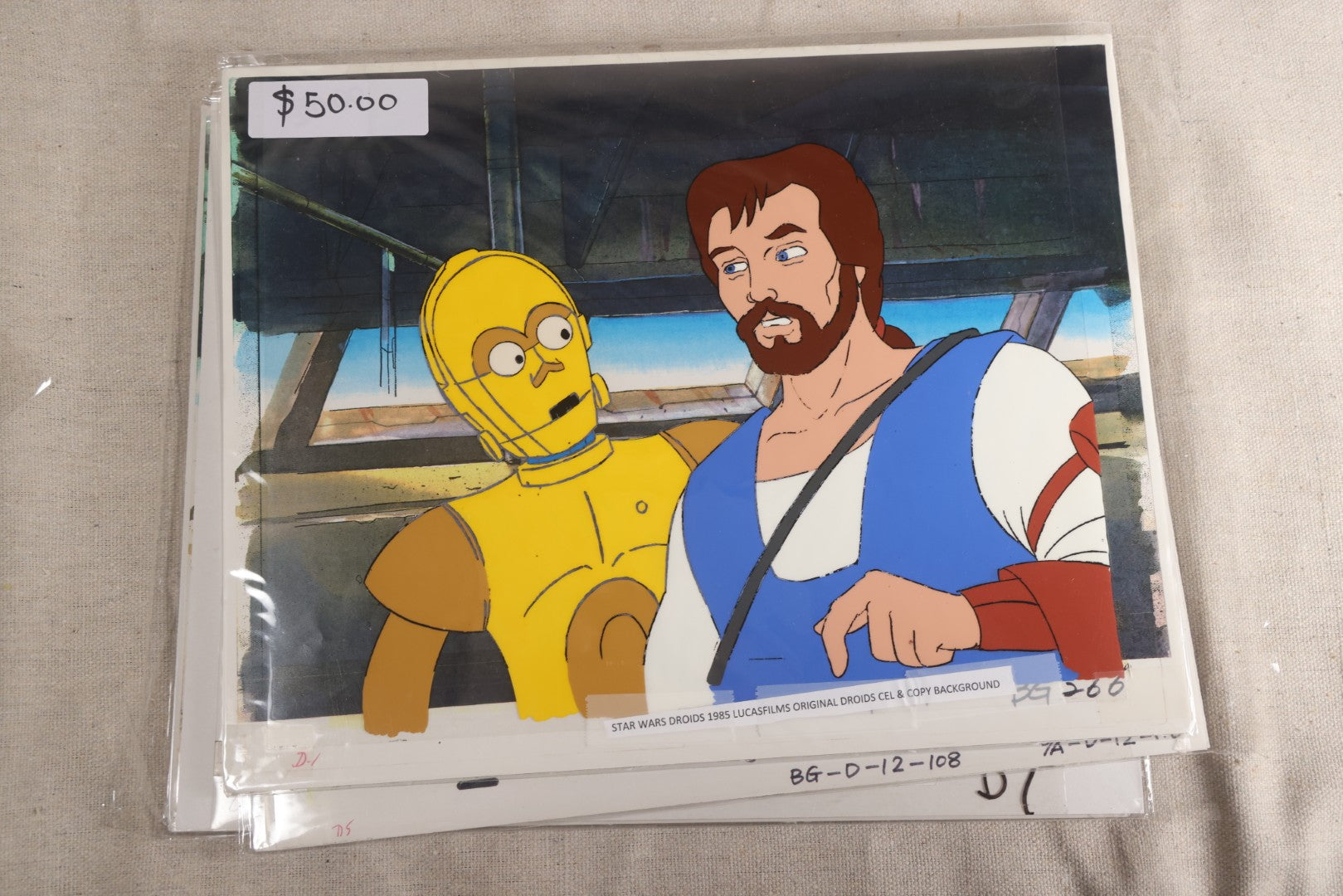 Lot 131 - Grouping Of 14+ Vintage "Star Wars: Droids" Production Animation Cels, Production Drawings, And Backgrounds, Nelvana/Lucasfilm, 1985-1986