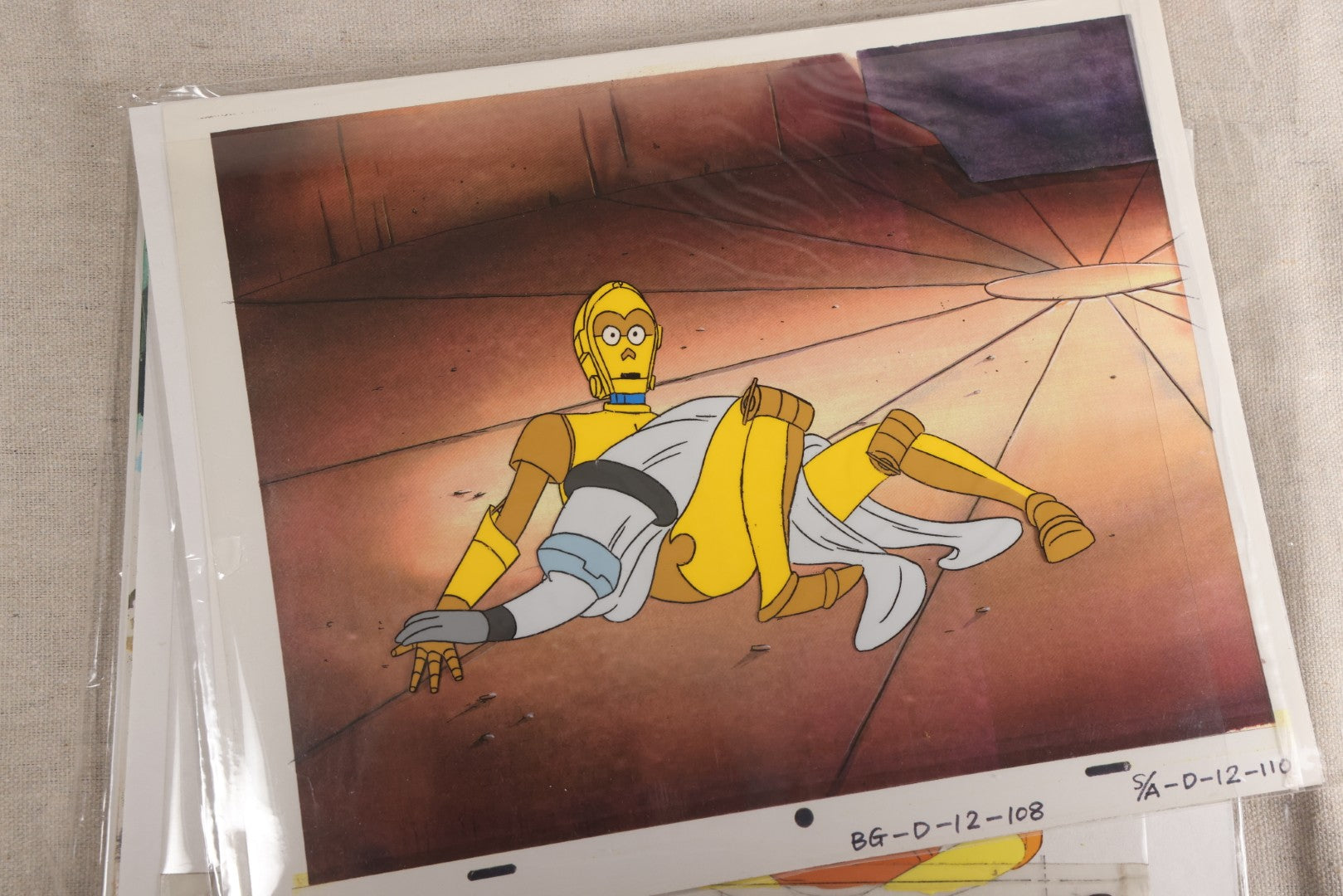 Lot 131 - Grouping Of 14+ Vintage "Star Wars: Droids" Production Animation Cels, Production Drawings, And Backgrounds, Nelvana/Lucasfilm, 1985-1986