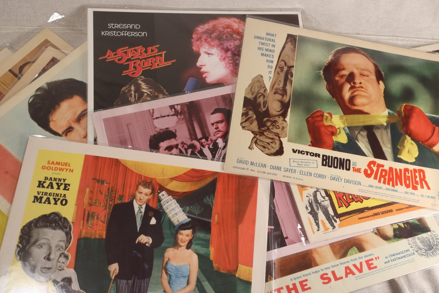 Lot 133 - Grouping Of 25+ Vintage Movie Lobby Cards, "A Star Is Born," "The Strangler," "The Slave," And Others, 1950s-1970s