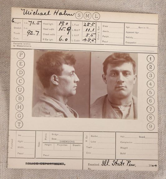 Lot 150 - Antique Real-Photo Police Mugshot And Arrest Card For Michael Hahn, Arrested For Larceny, Illinois State Penitentiary, 1904, Paroled 1907