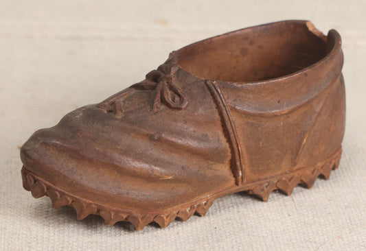 Lot 168 - Antique Folk Art Hand-Carved Wooden Shoe With Lace And Bow Detail And Scalloped Sole Edge