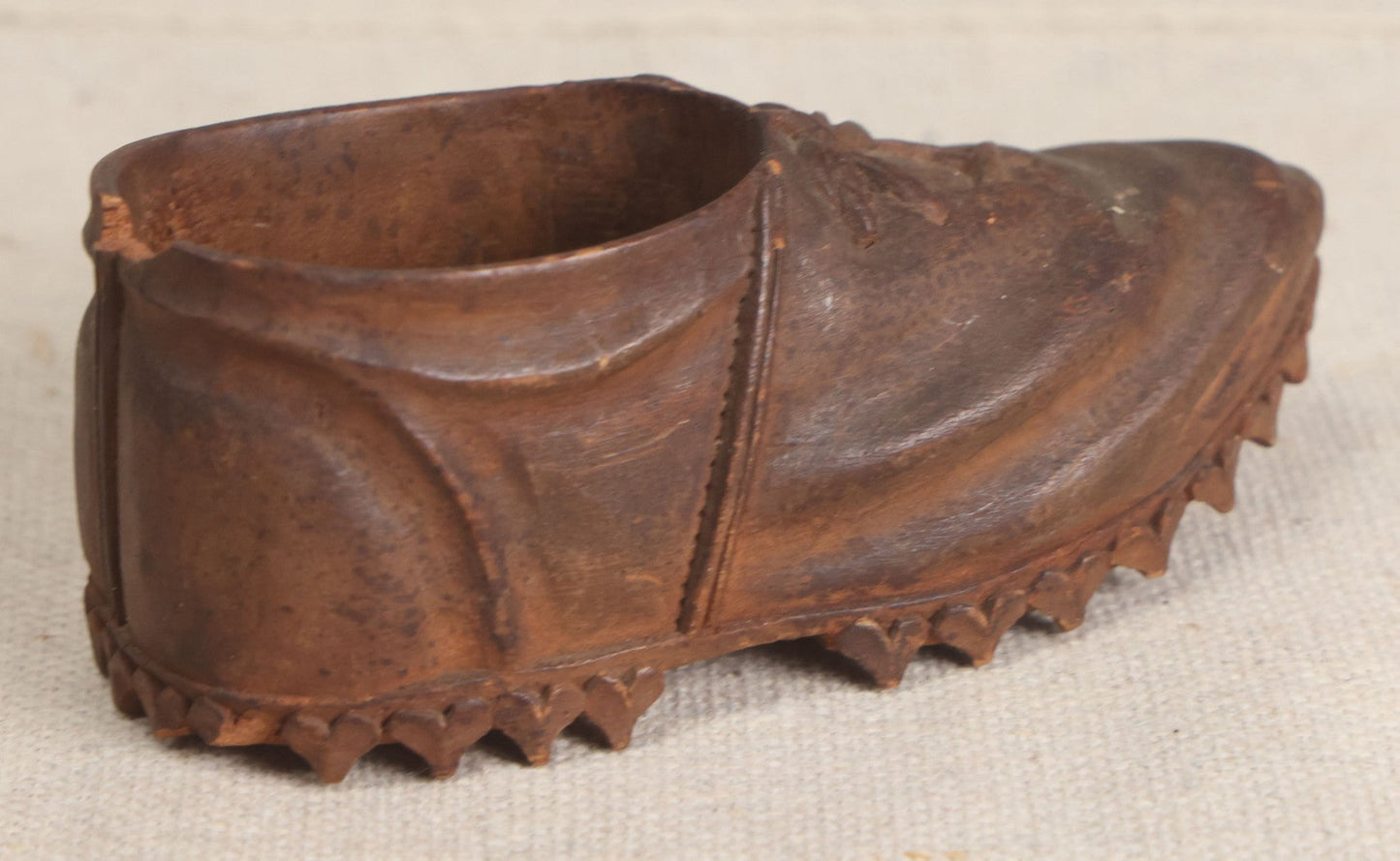 Lot 168 - Antique Folk Art Hand-Carved Wooden Shoe With Lace And Bow Detail And Scalloped Sole Edge