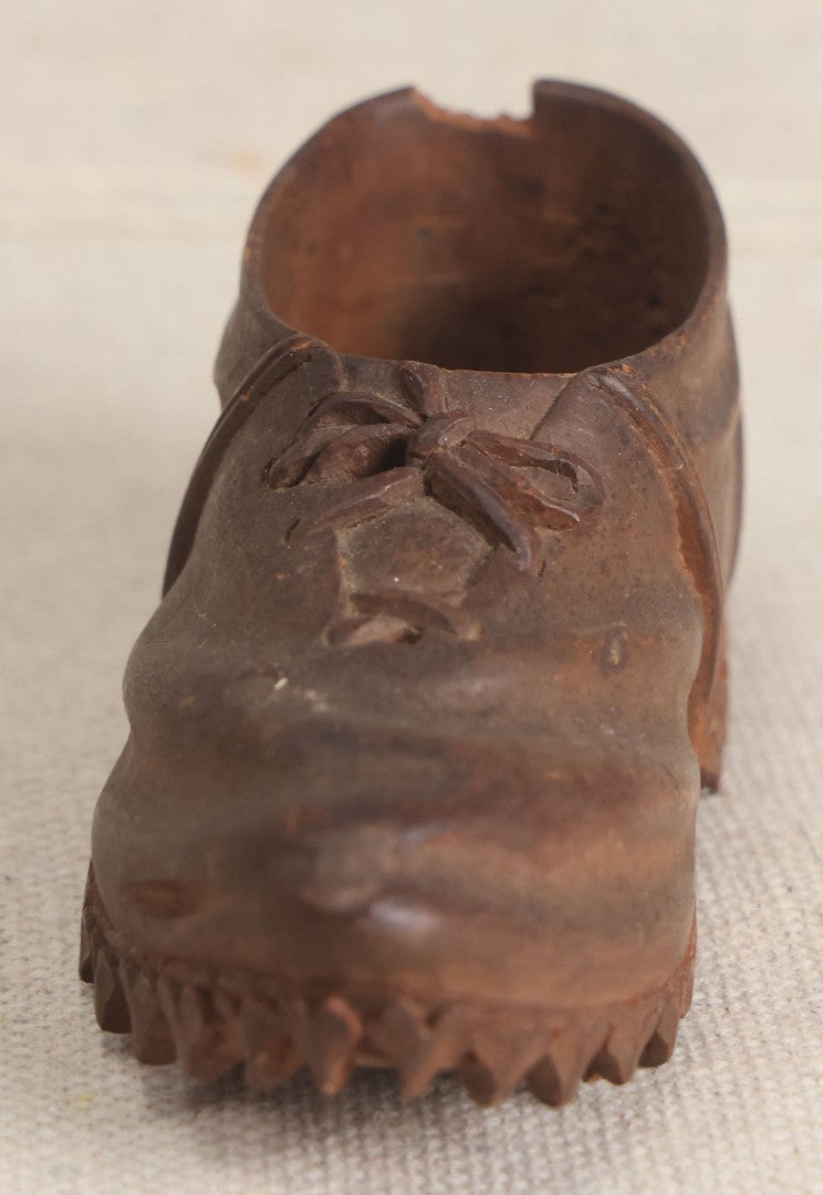Lot 168 - Antique Folk Art Hand-Carved Wooden Shoe With Lace And Bow Detail And Scalloped Sole Edge