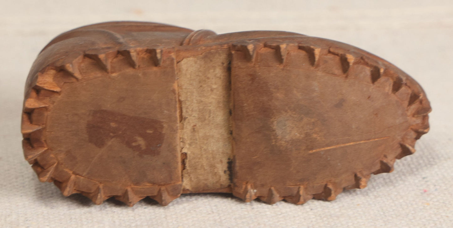 Lot 168 - Antique Folk Art Hand-Carved Wooden Shoe With Lace And Bow Detail And Scalloped Sole Edge