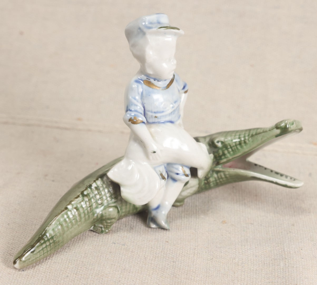 Lot 173 - Vintage Porcelain Figural Ashtray Of A Boy Riding An Alligator