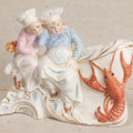 Lot 174 - Antique Bisque Figural Vase With Two Children And A Lobster, Likely German, 4" Height