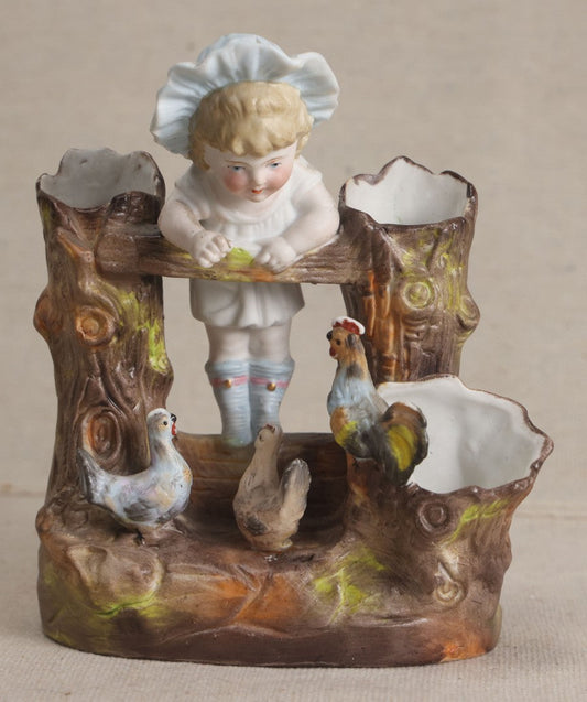Lot 179 - Antique Bisque Figural Vase With Girl Leaning Over A Fence With Chickens And Tree Stump Vessels