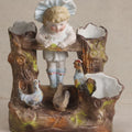 Lot 179 - Antique Bisque Figural Vase With Girl Leaning Over A Fence With Chickens And Tree Stump Vessels, 6" Height
