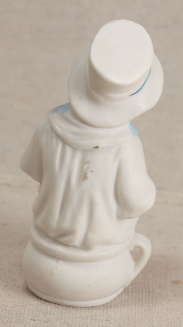 Lot 181 - Antique Bisque Figure of a Child With White Hat Seated on a Chamber Pot, Likely German