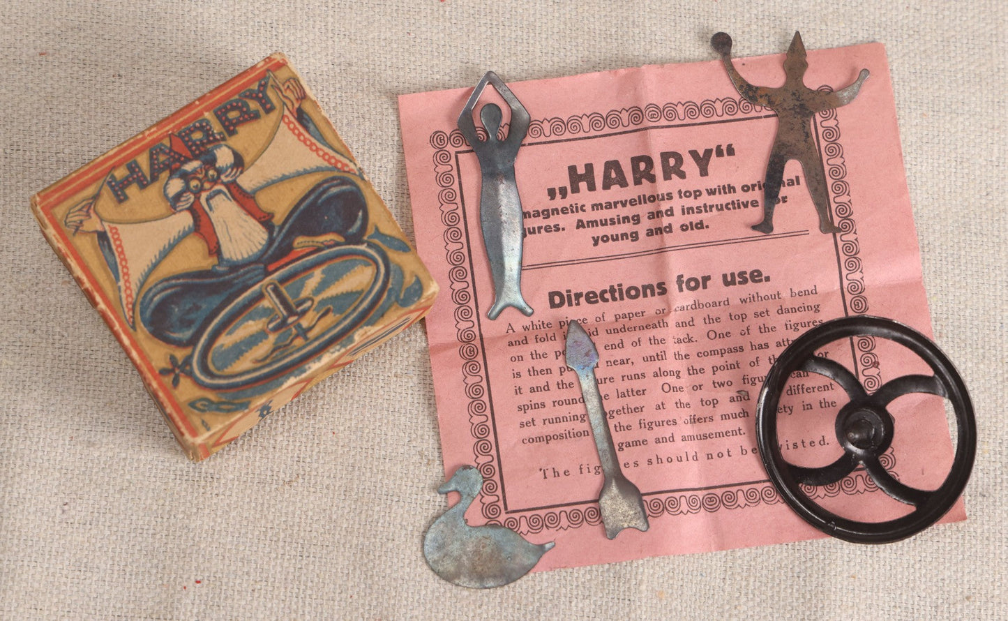 Lot 186 - Vintage "Harry" Magnetic Spinning Top Toy With Figures And Instruction Sheet In Printed Box, Made In Germany