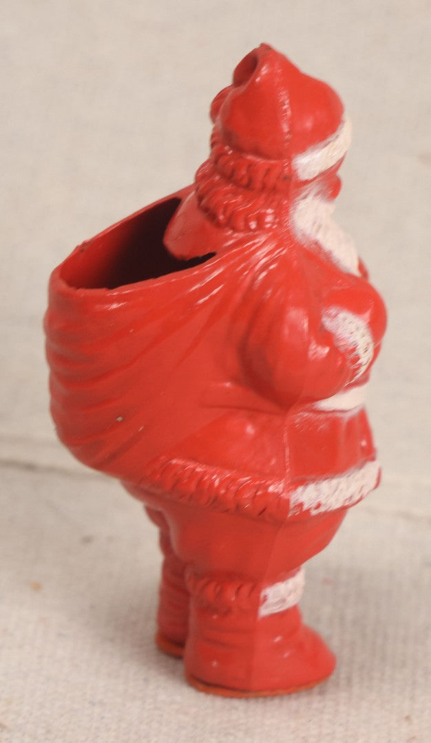 Lot 187 - Vintage Irwin Hard Plastic Santa Claus On Skis Candy Container Christmas Ornament With Open Toy Sack, Circa 1940s Missing Skis, U.S.A..