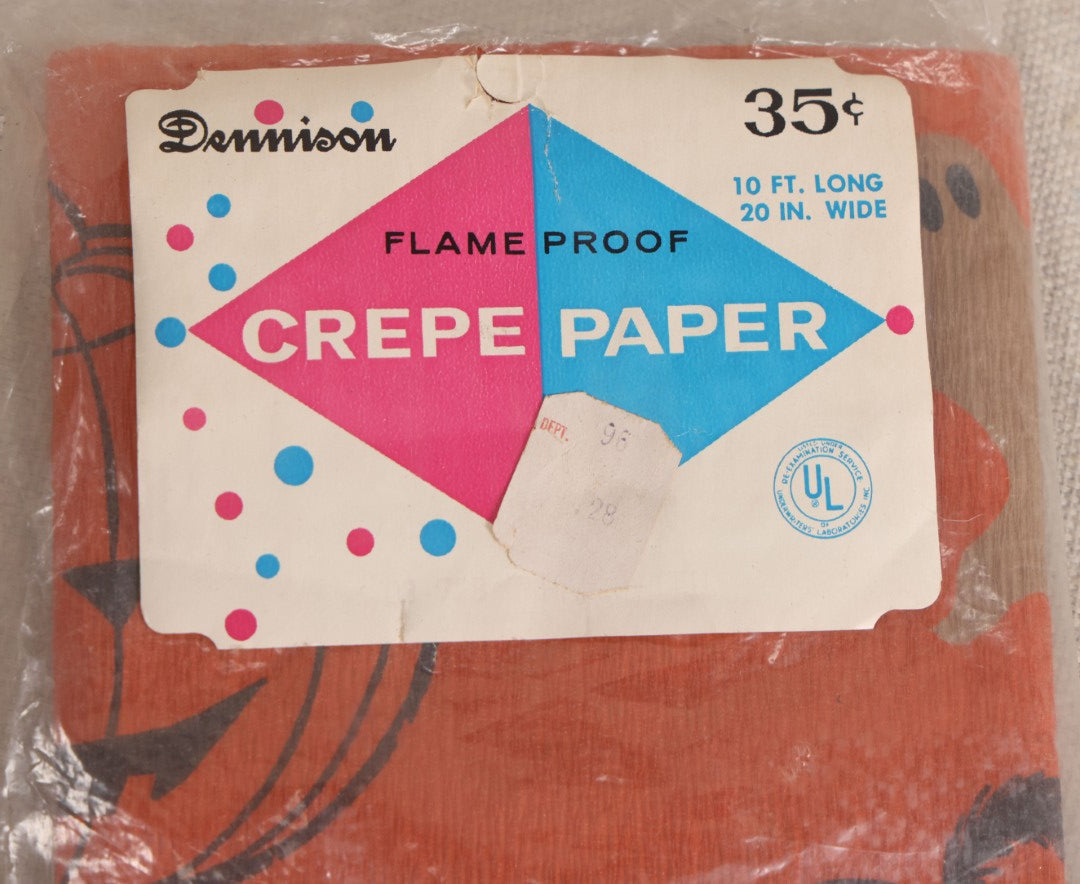 Lot 188 - Vintage Orange Dennison Halloween Flame Proof Crepe Paper With Black Cat, Jack-O-Lantern, And Gray Ghost Graphics In Original Packaging