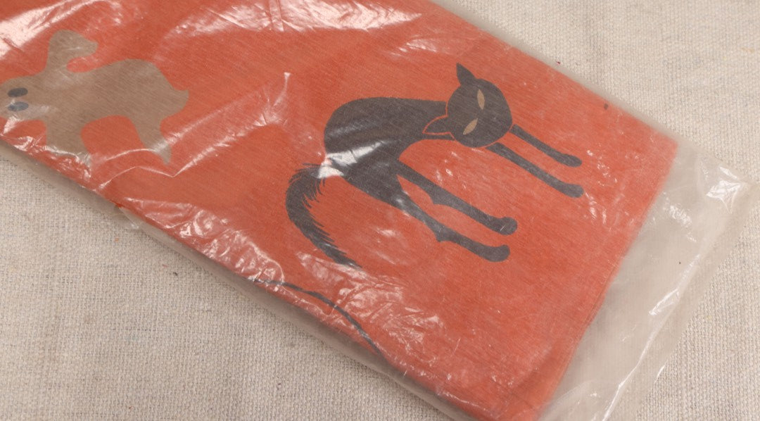 Lot 188 - Vintage Orange Dennison Halloween Flame Proof Crepe Paper With Black Cat, Jack-O-Lantern, And Gray Ghost Graphics In Original Packaging