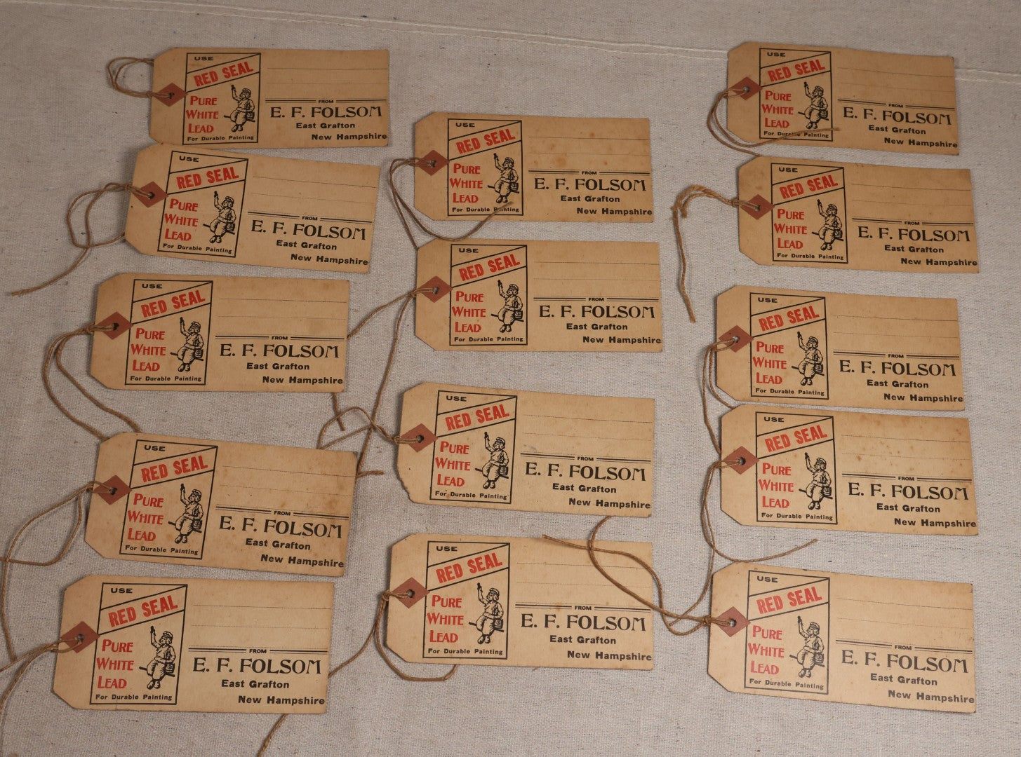 Lot 192 - Grouping Of 14 Antique Red Seal Pure White Lead Paint Advertising Shipping Tags From E.F. Folsom, East Grafton, New Hampshire