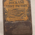 Lot 193 - Antique Dockash Stove Factory Tin Lithographed Advertising Wall Match Holder With Factory Illustration, Scranton, Pennsylvania