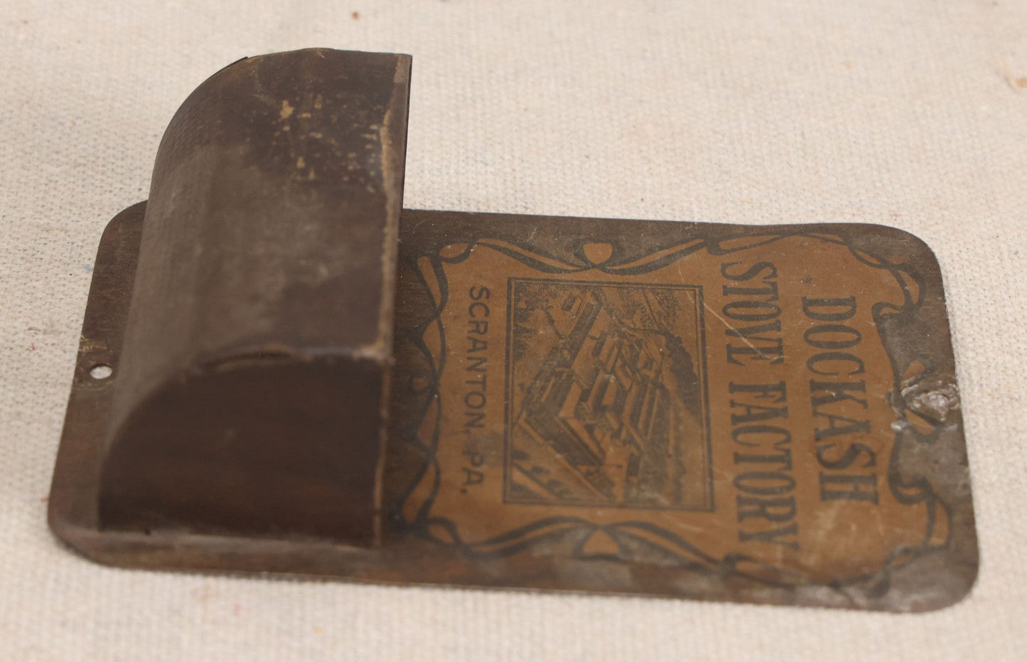 Lot 193 - Antique Dockash Stove Factory Tin Lithographed Advertising Wall Match Holder With Factory Illustration, Scranton, Pennsylvania