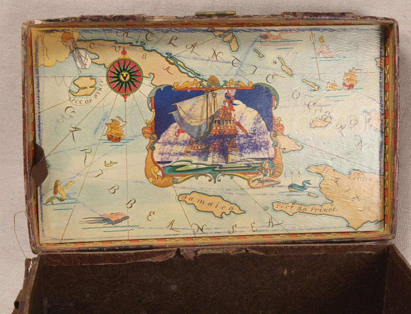 Lot 199 - Vintage Paper-Covered Dome-Top Play Trunk With Hand-Painted Designs And Pasted Caribbean Map Interior