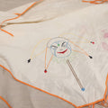 Lot 222 - Vintage Hand-Embroidered Card Table Cover With Joker Figure And Playing Card Suit Symbols, Orange Binding With Corner Ties, 29-1/2" x 31"