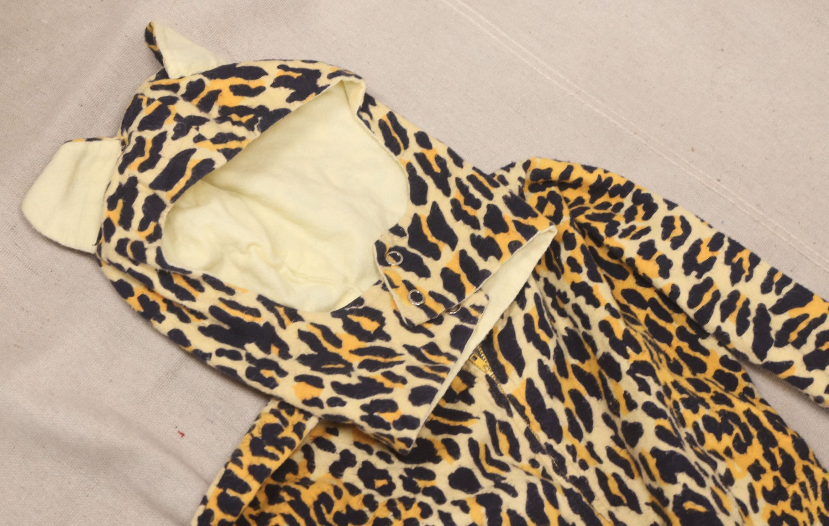 Lot 224 - Vintage Two-Piece Leopard Print Child's Halloween Costume With Attached Tail And Separate Hood