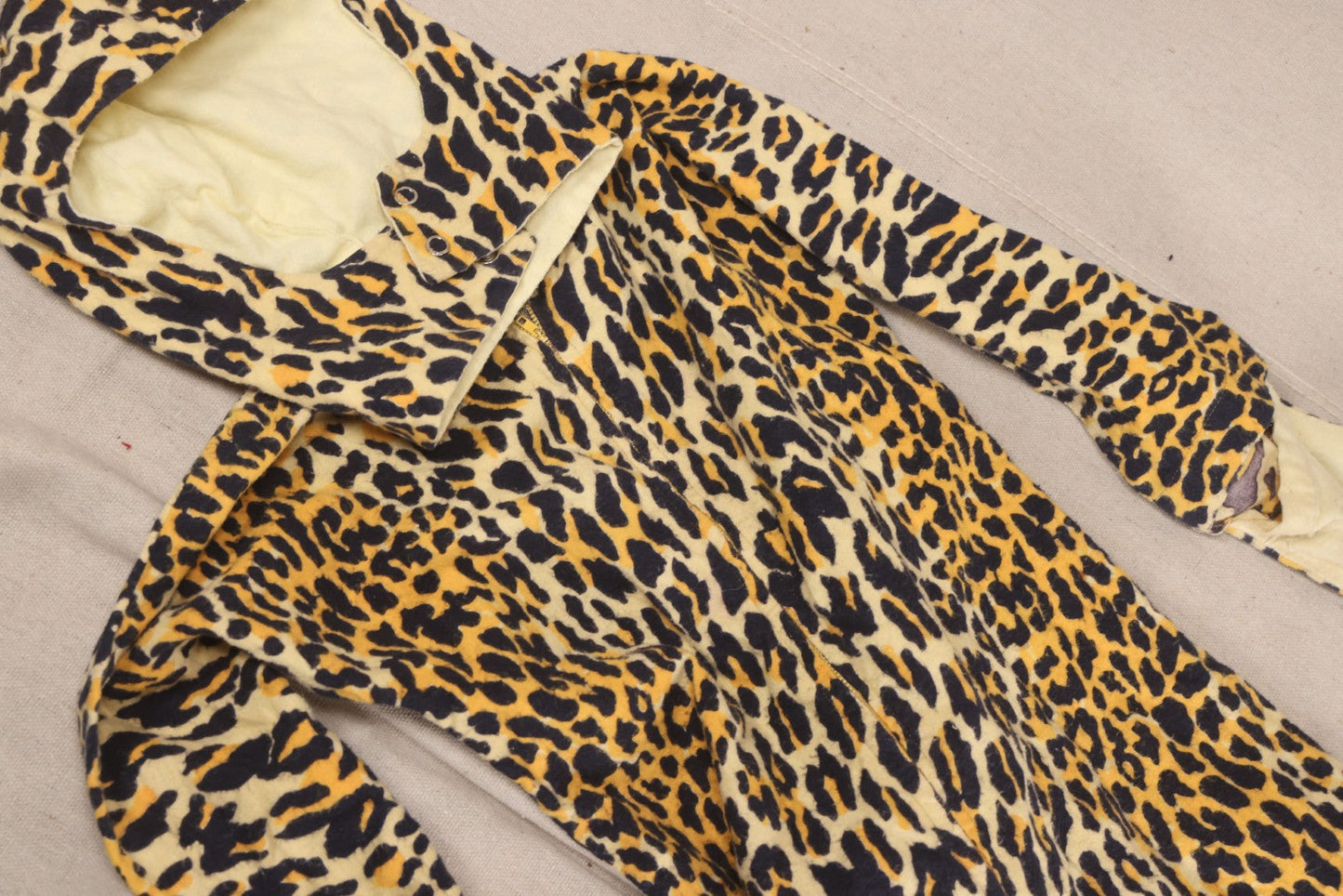 Lot 224 - Vintage Two-Piece Leopard Print Child's Halloween Costume With Attached Tail And Separate Hood