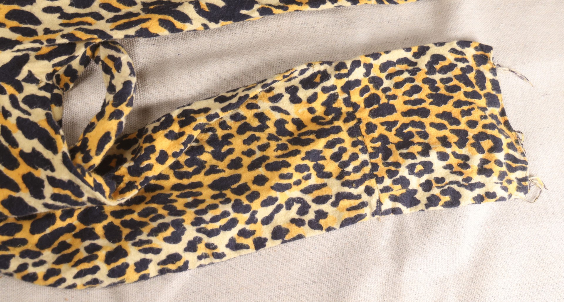 Lot 224 - Vintage Two-Piece Leopard Print Child's Halloween Costume With Attached Tail And Separate Hood