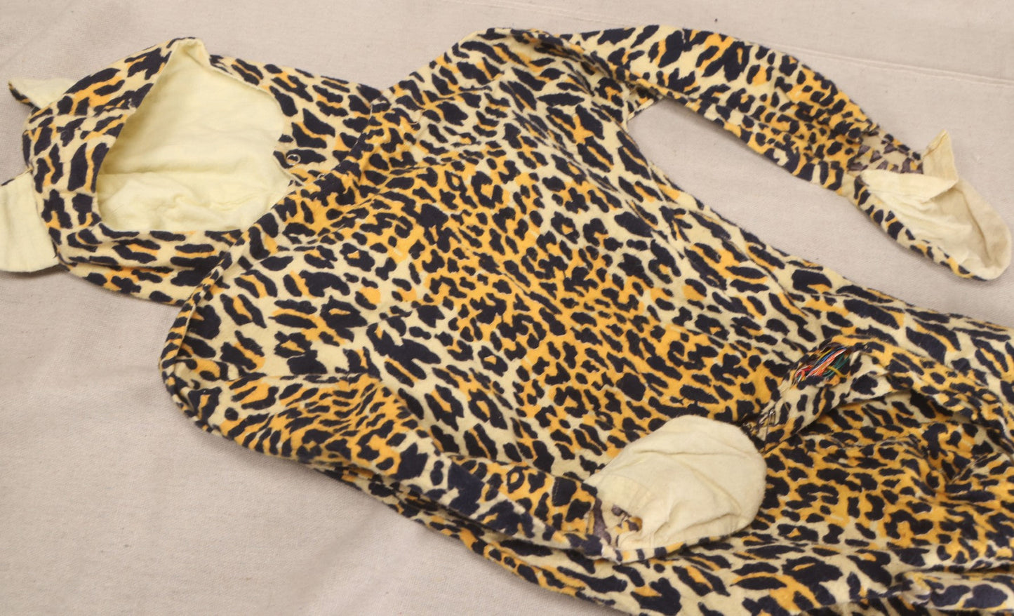 Lot 224 - Vintage Two-Piece Leopard Print Child's Halloween Costume With Attached Tail And Separate Hood