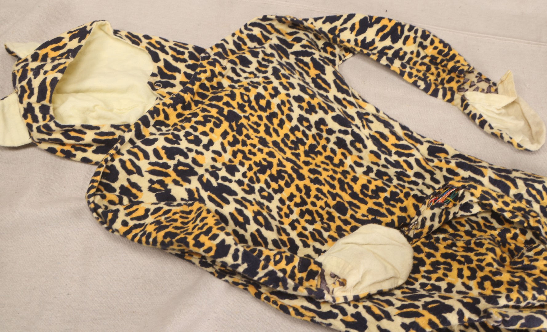 Lot 224 - Vintage Two-Piece Leopard Print Child's Halloween Costume With Attached Tail And Separate Hood