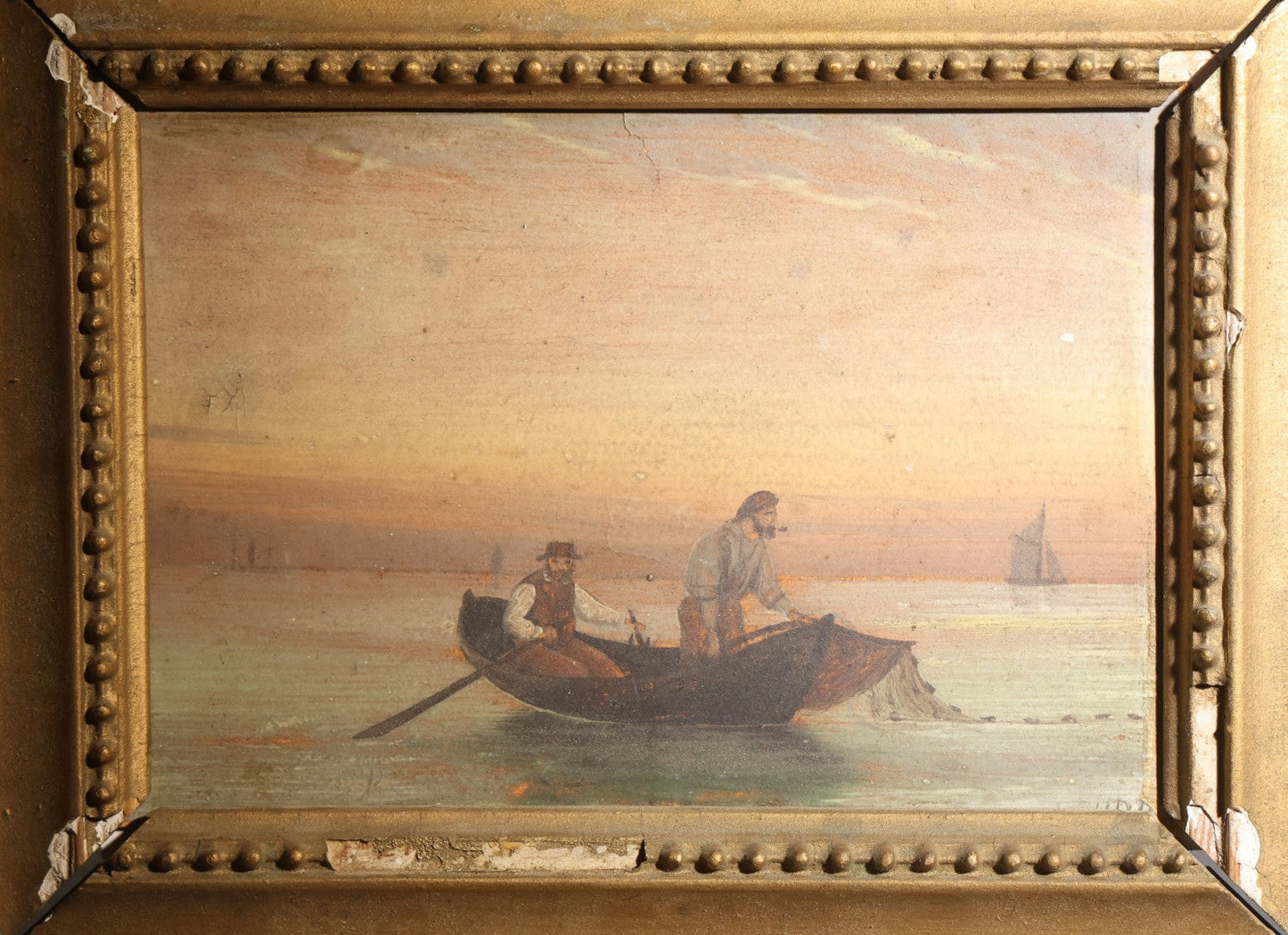 Lot 004 - Antique Oil Painting On Board, Two Fishermen Hauling A Net From A Rowboat At Sunset, Sailboat On The Horizon, In Gilt Frame