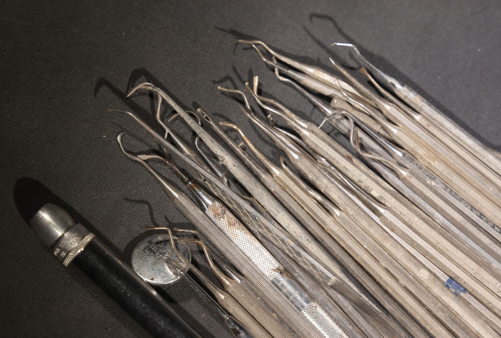 Lot 013 - Grouping Of Vintage Stainless Steel Dental Tools, Made In U.S.A.., Including Clev-Dent, Premierlite, S.S. White, And Kerr Examples, Scalers, Explorers, And Additional Instruments