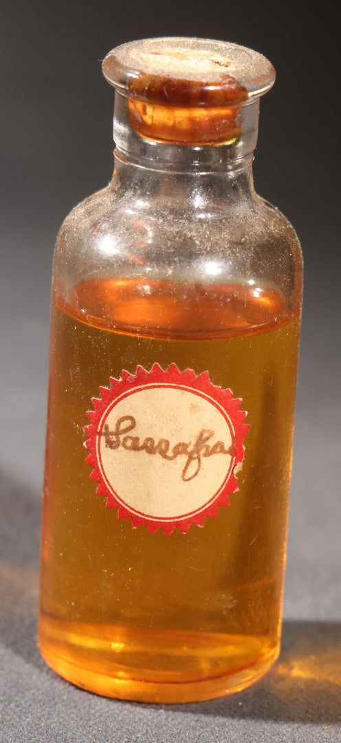 Lot 018 - Grouping Of Six Vintage Glass Flavoring Oil Extract Bottles With Contents Including Anise, Lemon, Lime, Clove, Orange, And Sassafras