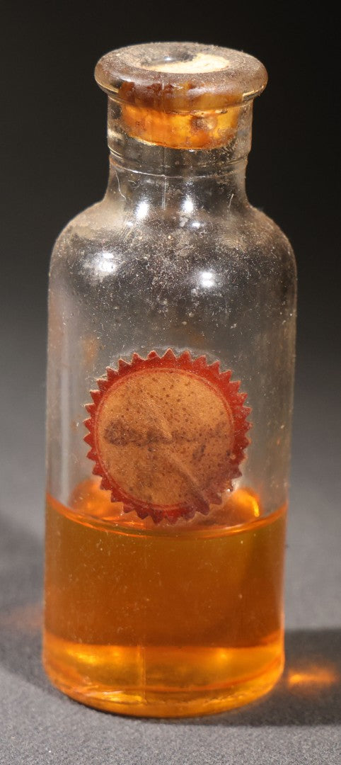 Lot 018 - Grouping Of Six Vintage Glass Flavoring Oil Extract Bottles With Contents Including Anise, Lemon, Lime, Clove, Orange, And Sassafras
