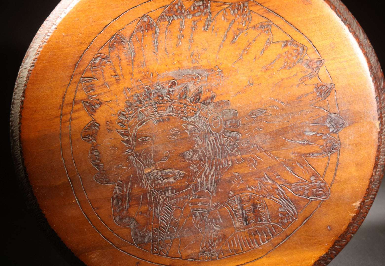 Lot 026 - Antique Pyrography Wood Plaque, Portrait Of A Native American Figure In War Bonnet, Chip-Carved Border, 13-3/8" x 13-1/8"