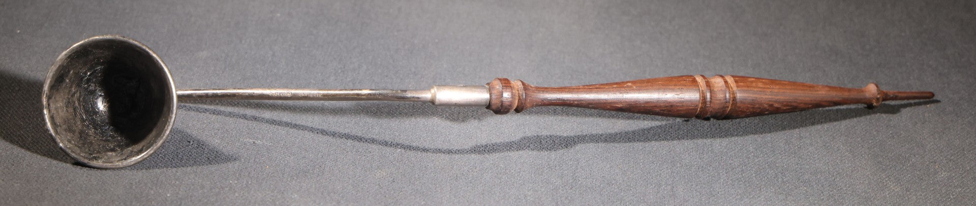 Lot 028 - Pair Of Antique Sterling Silver Candle Snuffers With Turned Wooden Handles, Sold By Gump's Of San Francisco, California, With Mark