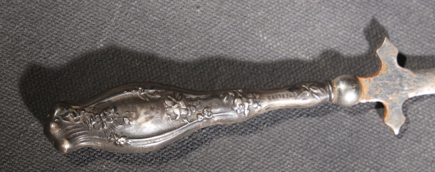 Lot 029 - Antique Sterling Silver-Handled Sword-Form Letter Opener With Floral Repousse Handle And Cross Guard