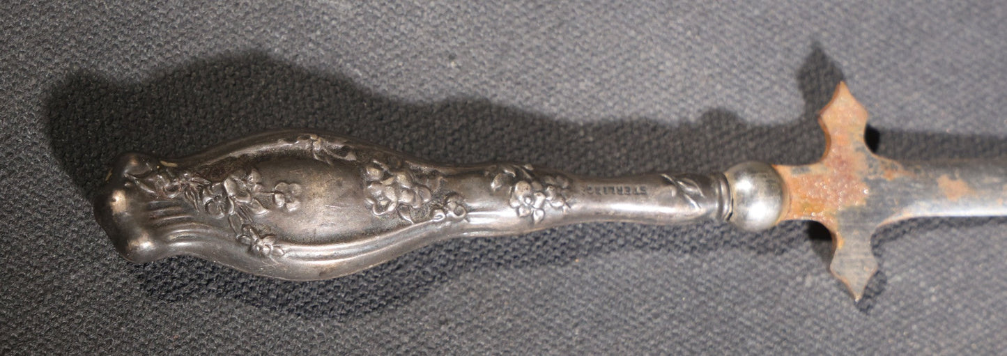 Lot 029 - Antique Sterling Silver-Handled Sword-Form Letter Opener With Floral Repousse Handle And Cross Guard