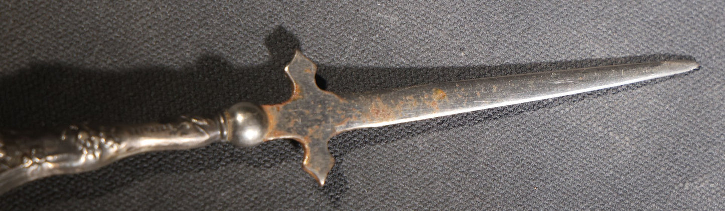Lot 029 - Antique Sterling Silver-Handled Sword-Form Letter Opener With Floral Repousse Handle And Cross Guard