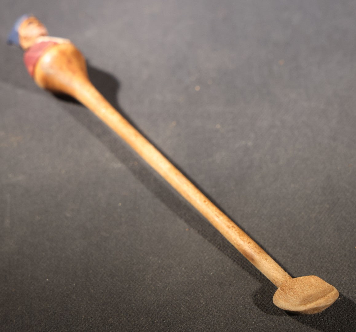 Lot 033 - Vintage Folk Art Hand-Carved And Painted Wooden Spoon With Figural Handle Of A Man In A Blue Cap And Red Jacket
