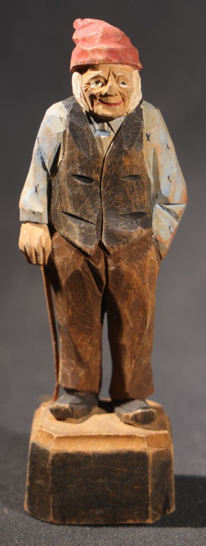 Lot 034 - Grouping Of Eight Vintage Folk Art Hand-Carved And Painted Wooden Figures In Traditional Dress